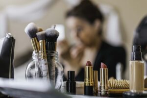 Makeup on table during photo session 